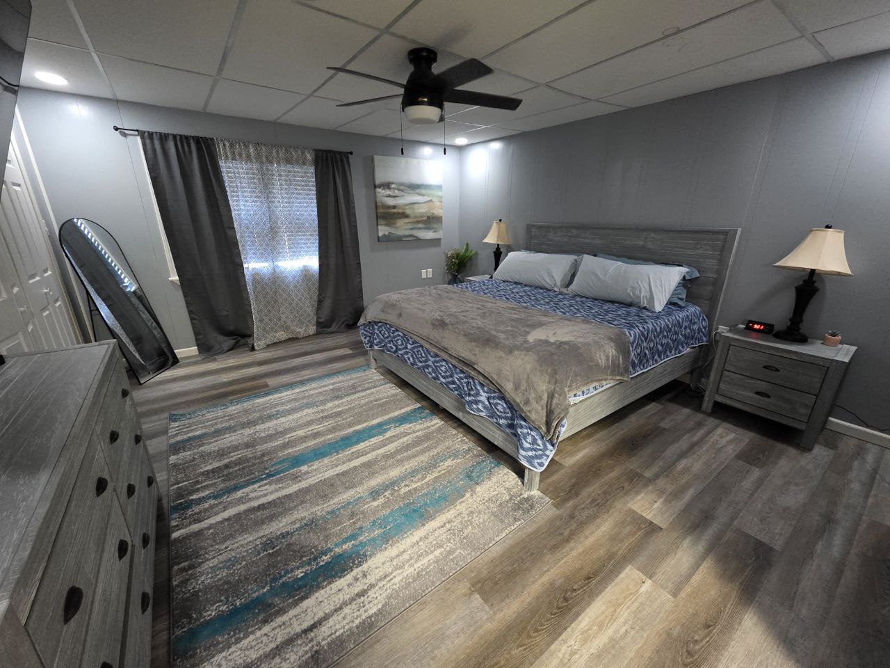 Peaceful primary bedroom at a Morgantown rental for WVU Medicine visitors